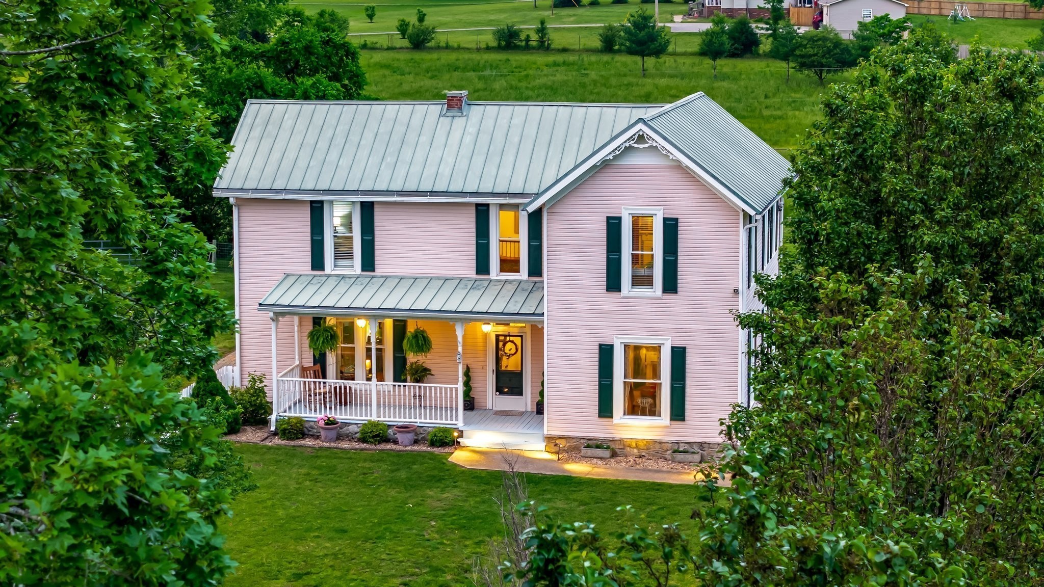 3310 Booker Ridge Road Mount Pleasant, TN 38474 - Photo 40 of 40 a front view of a house with garden