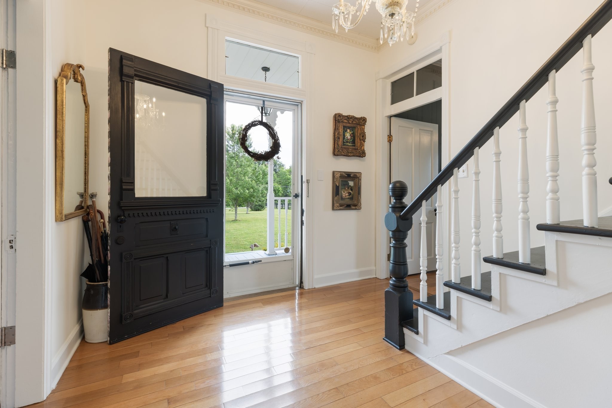 3310 Booker Ridge Road Mount Pleasant, TN 38474 - Photo 5 of 40 a view of an entryway with wooden floor and staircase