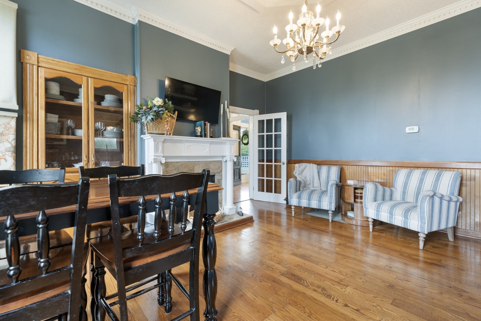 3310 Booker Ridge Road Mount Pleasant, TN 38474 - Photo 8 of 40 a view of a dining room with furniture window and wooden floor