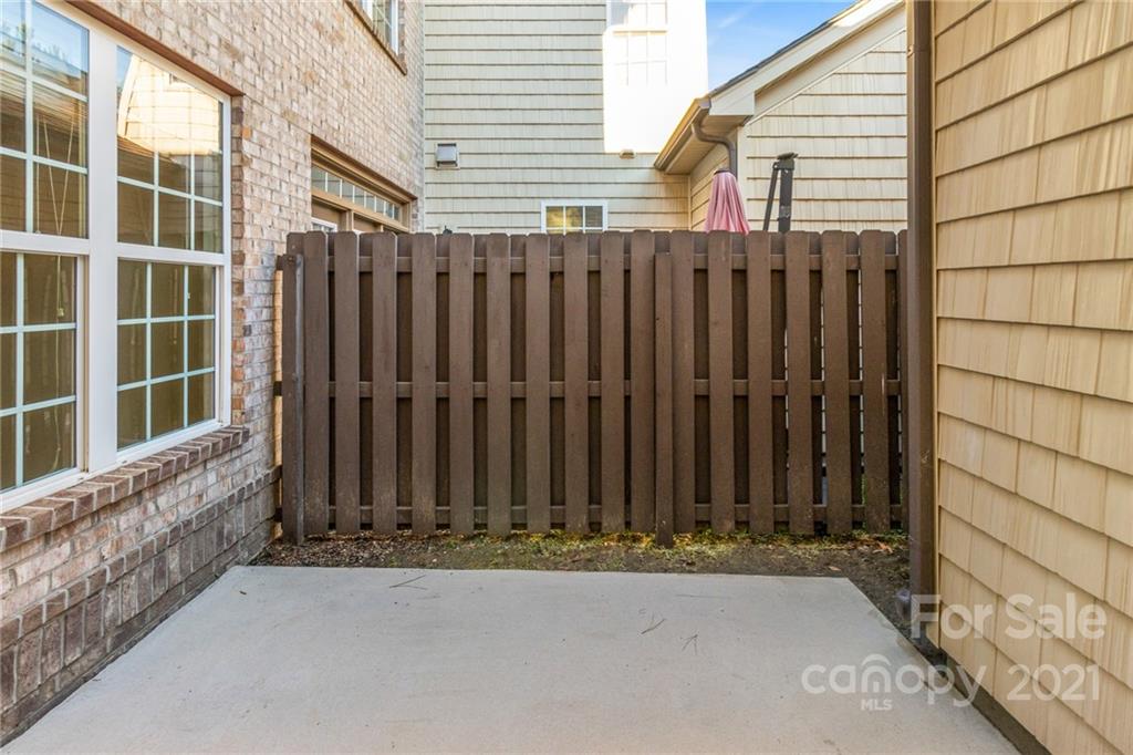 2263 Eversham Drive Northwest Concord, NC 28027 - Photo 14 of 21 a view of wooden door with wooden fence