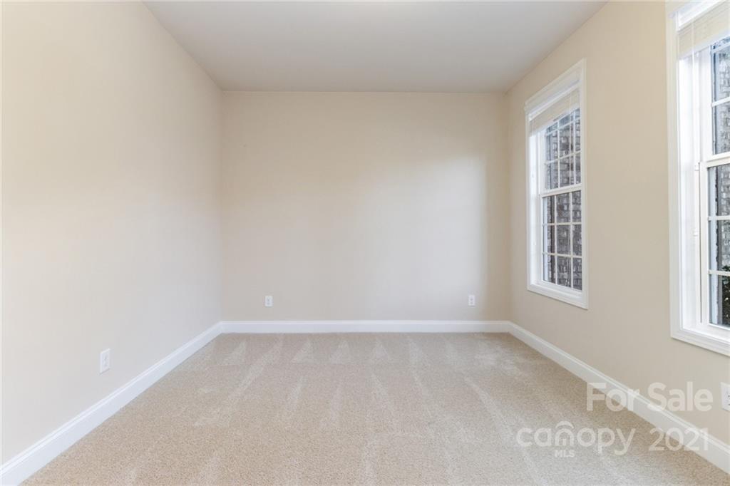 2263 Eversham Drive Northwest Concord, NC 28027 - Photo 15 of 21 a view of an empty room with a window