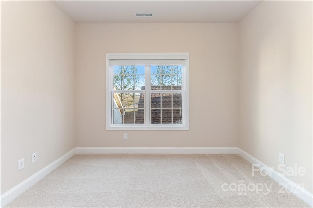 2263 Eversham Drive Northwest Concord, NC 28027 - Photo 18 of 21 an empty room with a window