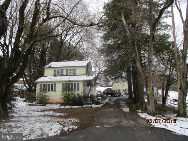 2324 Baldwin Mill Road Fallston, MD 21047 - Photo 1 of 1 a front view of a house with a yard