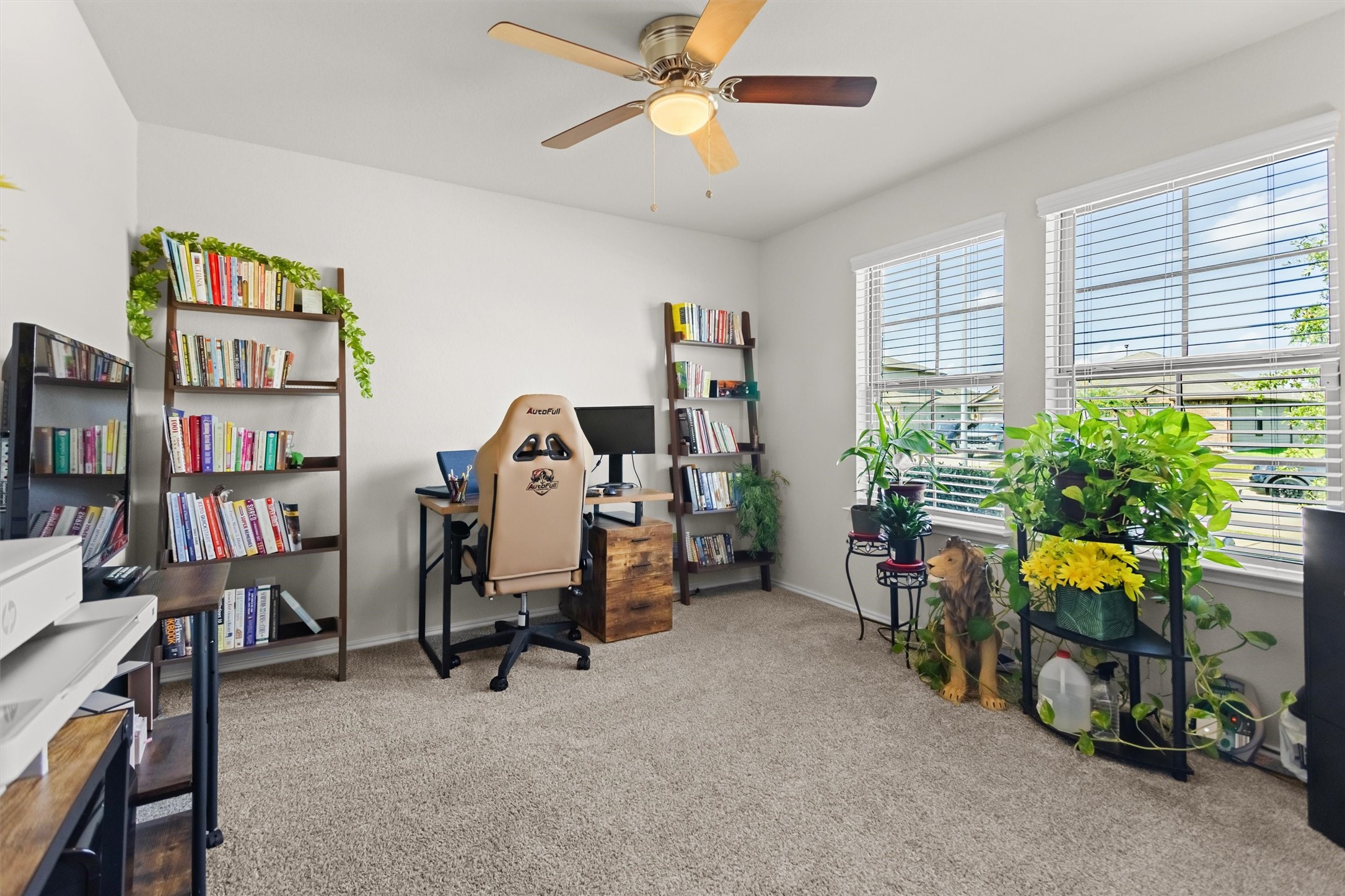 1711 Martin Spring Lane Rosenberg, TX 77469 - Photo 9 of 24 Versatile Home Office filled with natural light from multiple windows.