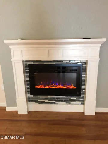 a living room with a fireplace