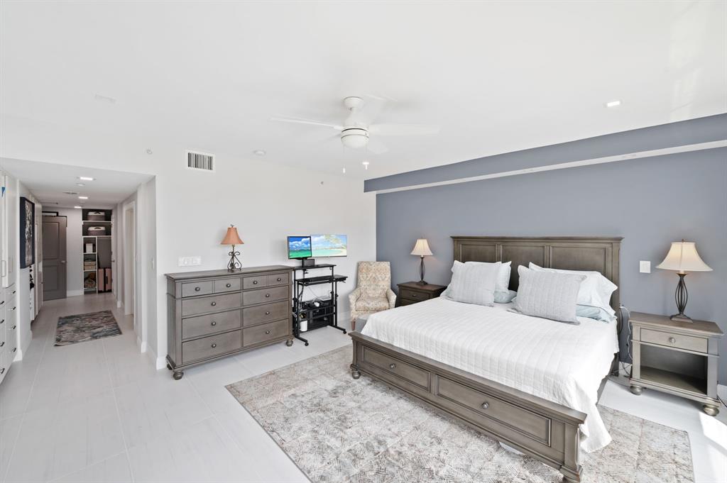400 Hendricks Isle, Unit 3A Fort Lauderdale, FL 33301 - Photo 22 of 37 a bedroom with a bed and furniture