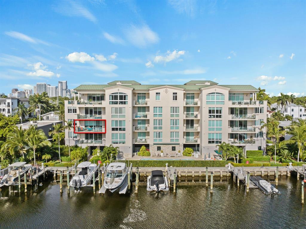 400 Hendricks Isle, Unit 3A Fort Lauderdale, FL 33301 - Photo 3 of 37 a view of a lake with building and outdoor space