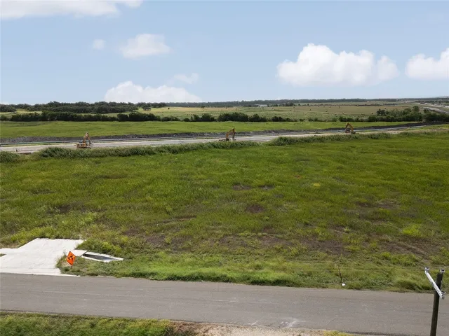 a view of an ocean and city