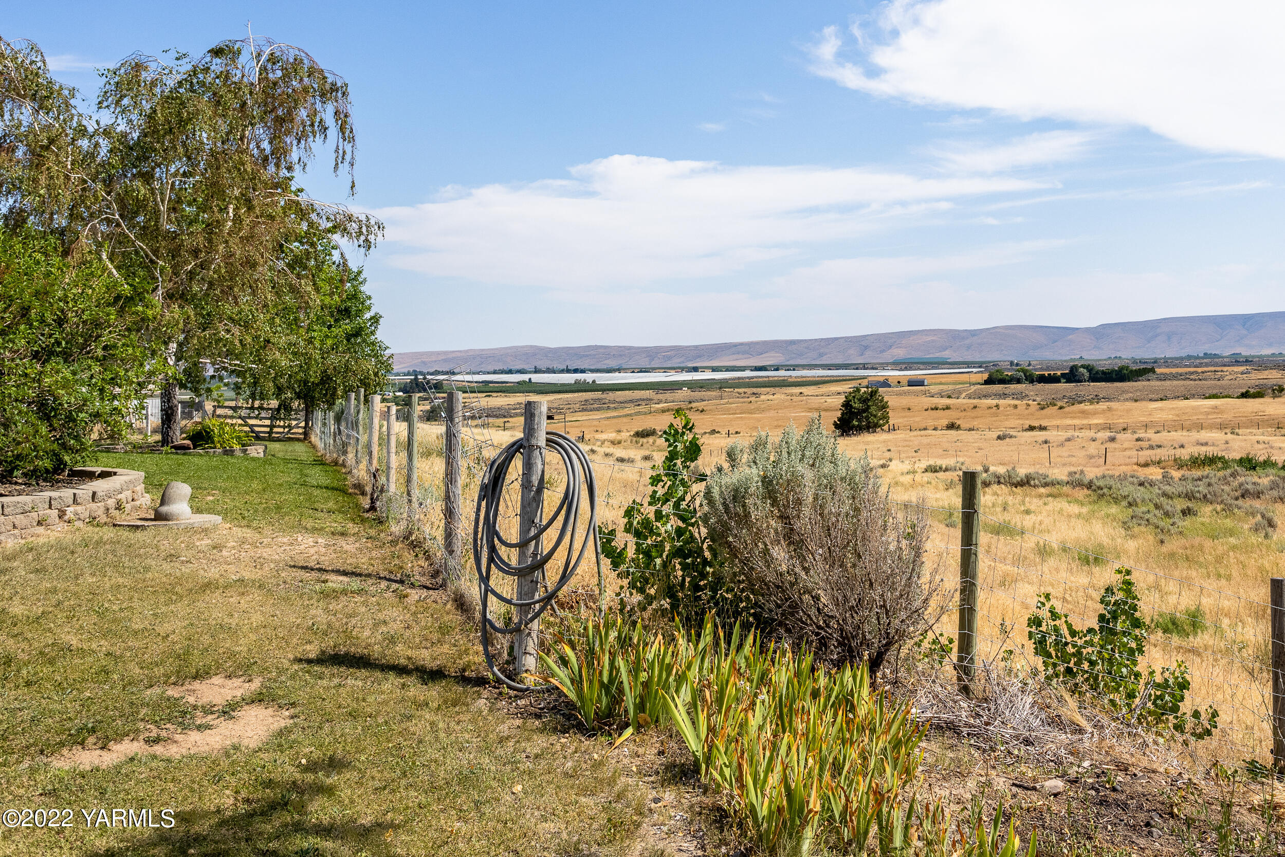 341 Winchester Road Yakima, WA 98908 - Photo 13 of 38 a view of a lake with a yard