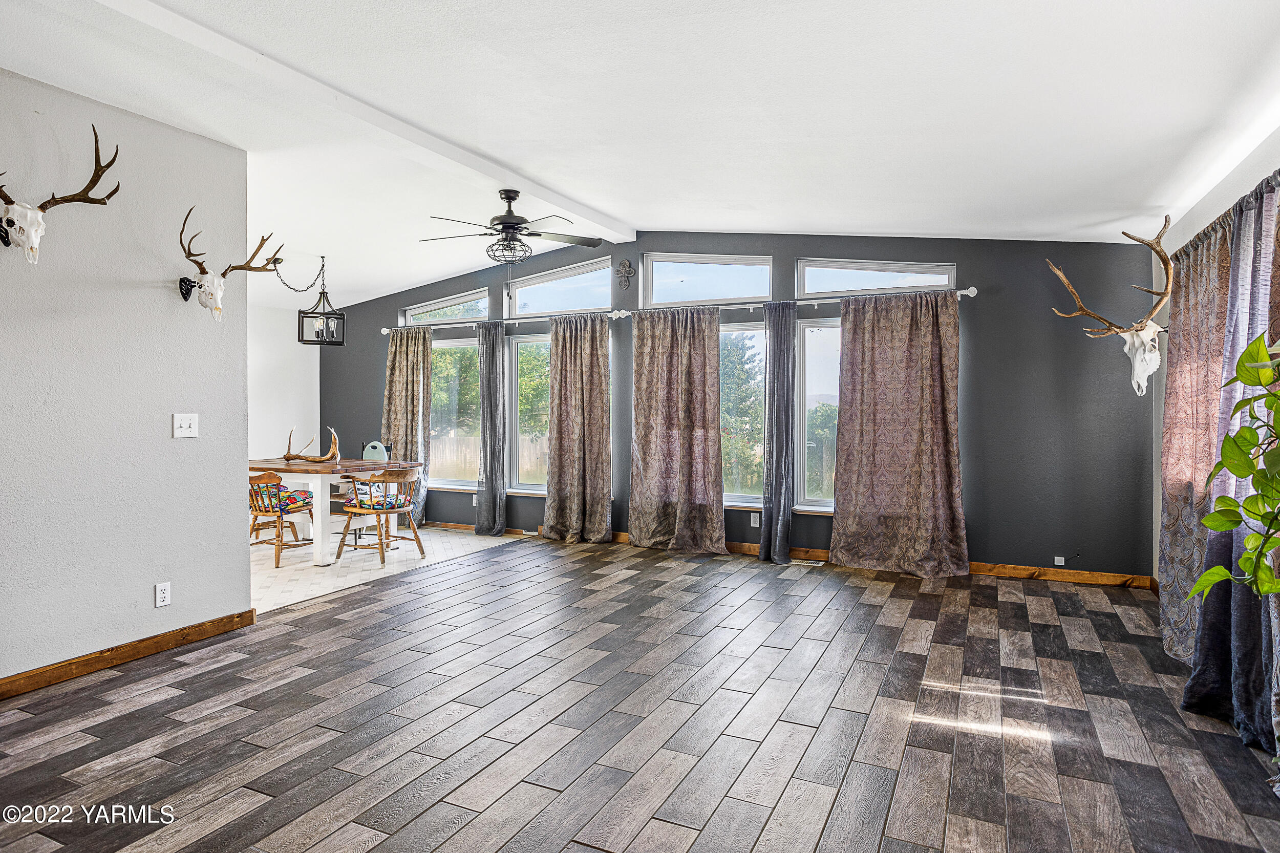 341 Winchester Road Yakima, WA 98908 - Photo 16 of 38 a view of room with furniture and wooden floor