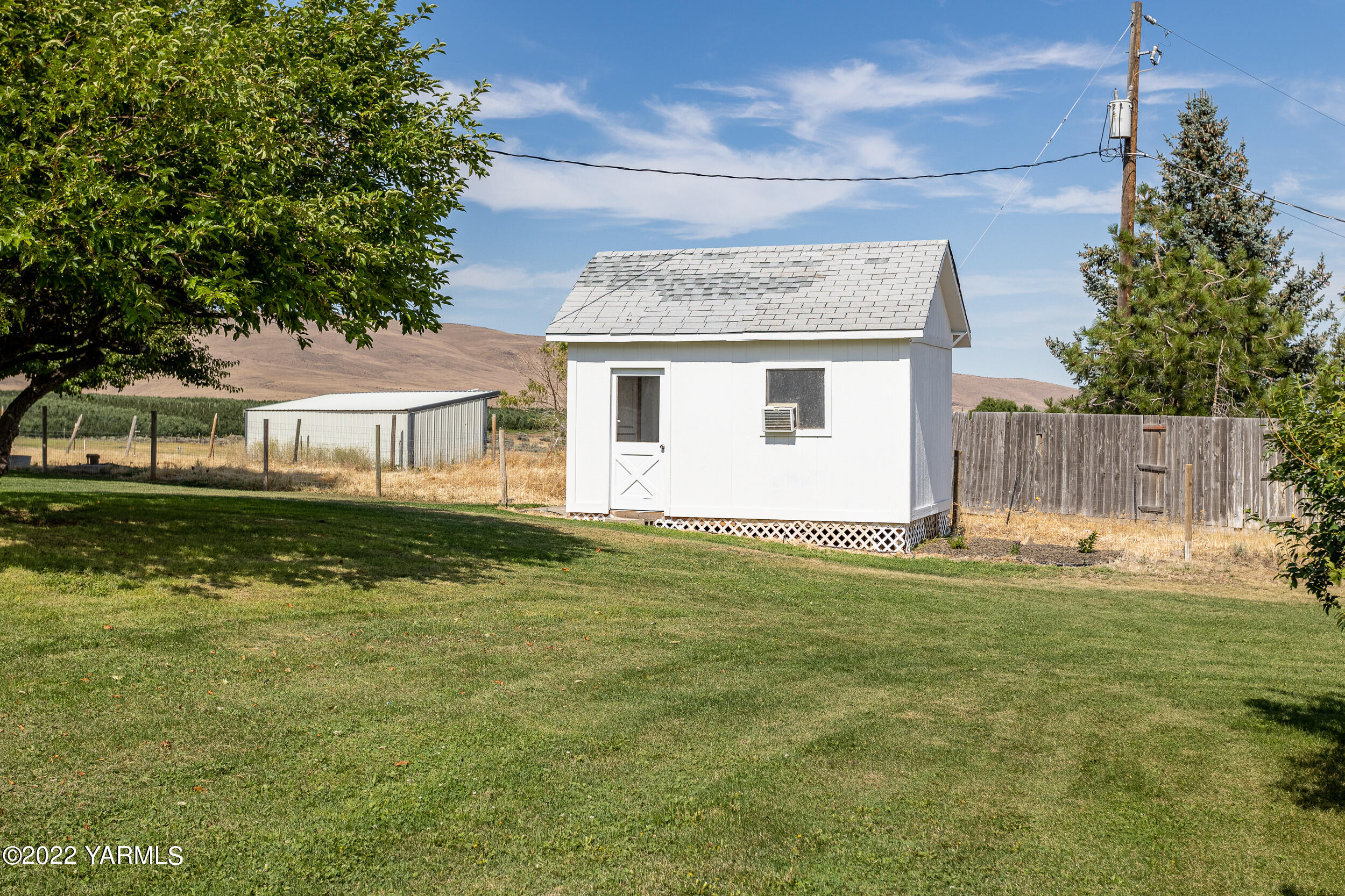 341 Winchester Road Yakima, WA 98908 - Photo 37 of 38 a house view with a swimming pool