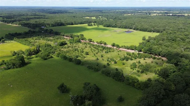 a view of a city with a lake