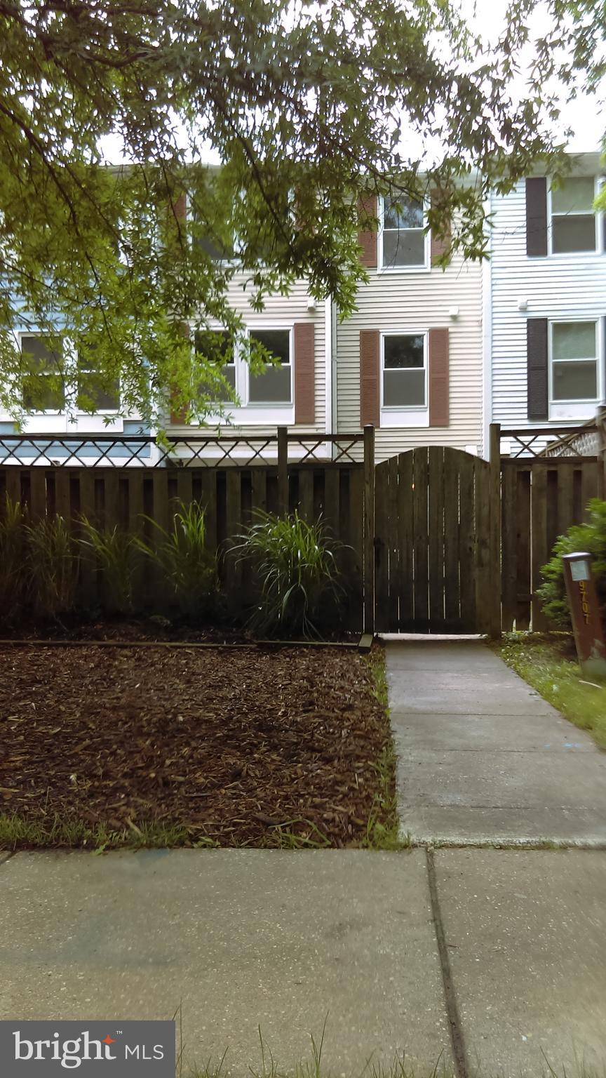 14116 Aldora Circle Silver Spring, MD 20904 - Photo 1 of 30 a view of a white house with a yard