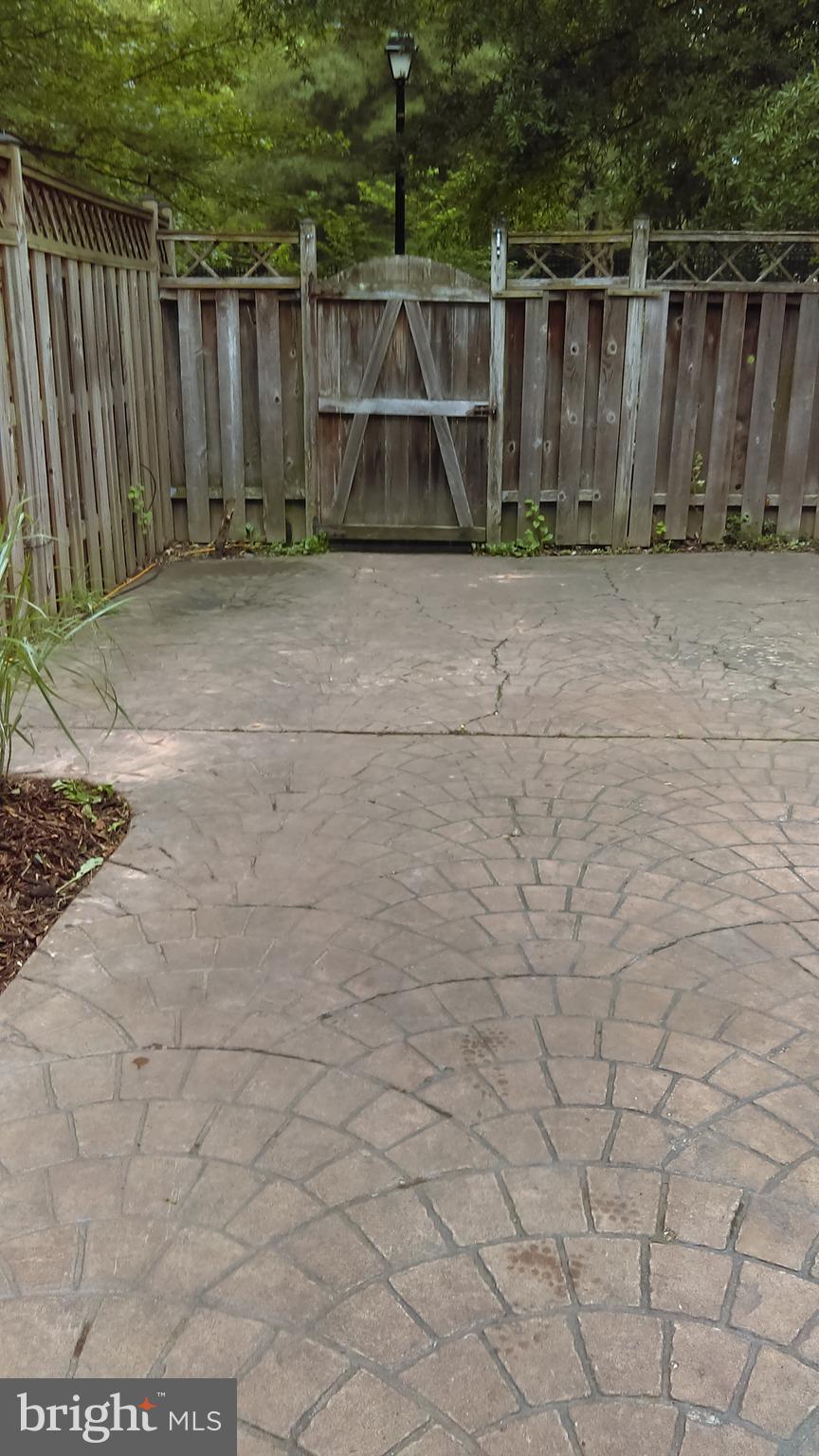 14116 Aldora Circle Silver Spring, MD 20904 - Photo 28 of 30 a view of backyard with wooden fence