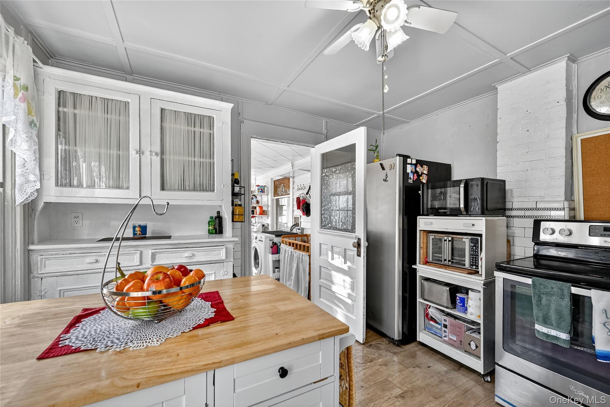 194 Old Liberty Road Monticello, NY 12701 - Photo 13 of 33 a kitchen with stainless steel appliances granite countertop a refrigerator and a stove