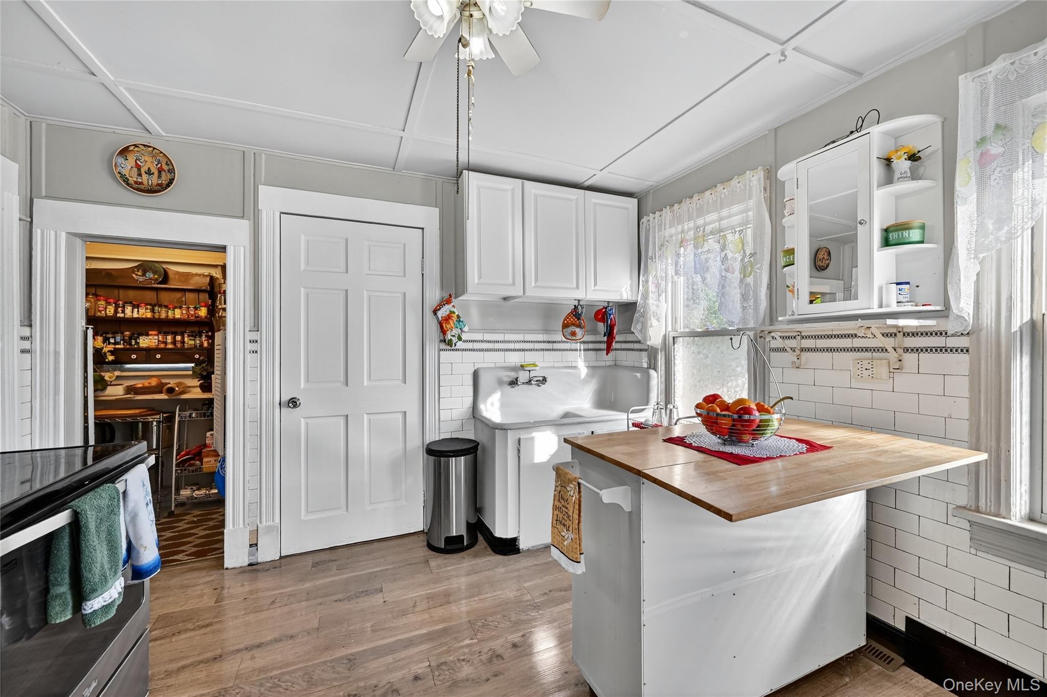 194 Old Liberty Road Monticello, NY 12701 - Photo 15 of 33 a kitchen with stainless steel appliances granite countertop a sink stove and refrigerator
