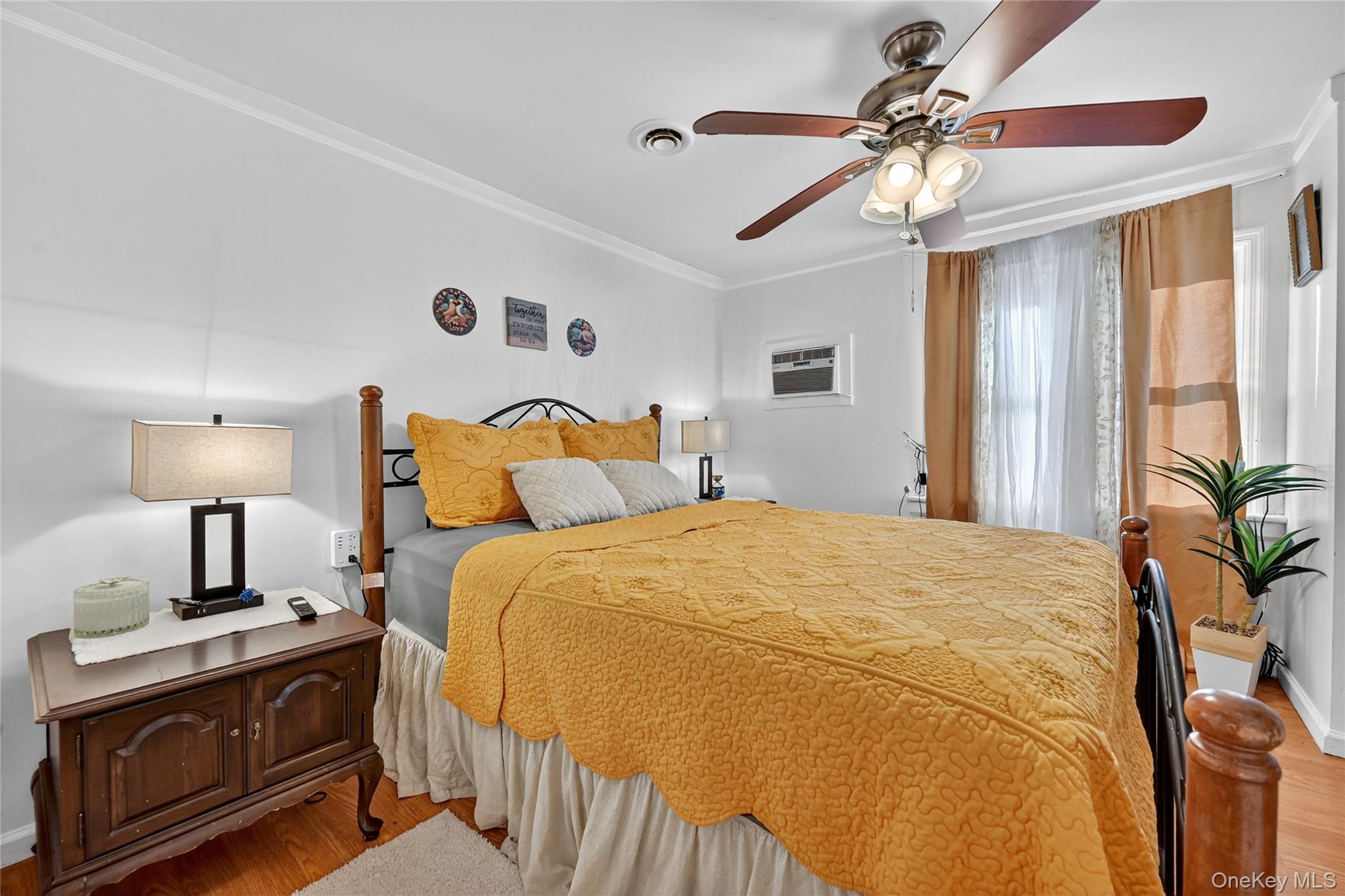 194 Old Liberty Road Monticello, NY 12701 - Photo 18 of 33 a bedroom with a bed and a chandelier