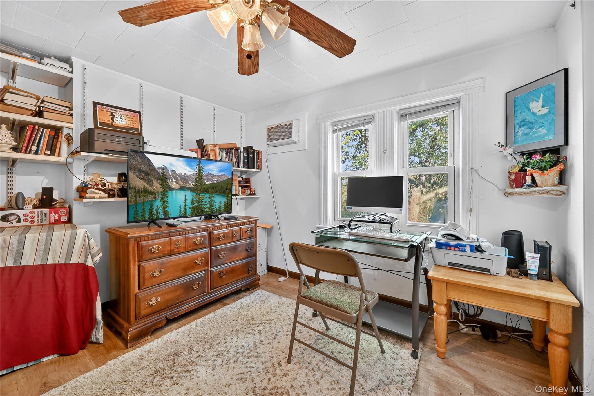194 Old Liberty Road Monticello, NY 12701 - Photo 23 of 33 a living room with furniture and a window