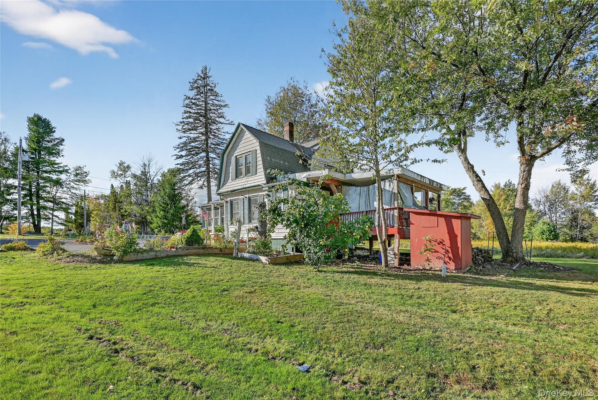 194 Old Liberty Road Monticello, NY 12701 - Photo 28 of 33 a view of house with yard and green space