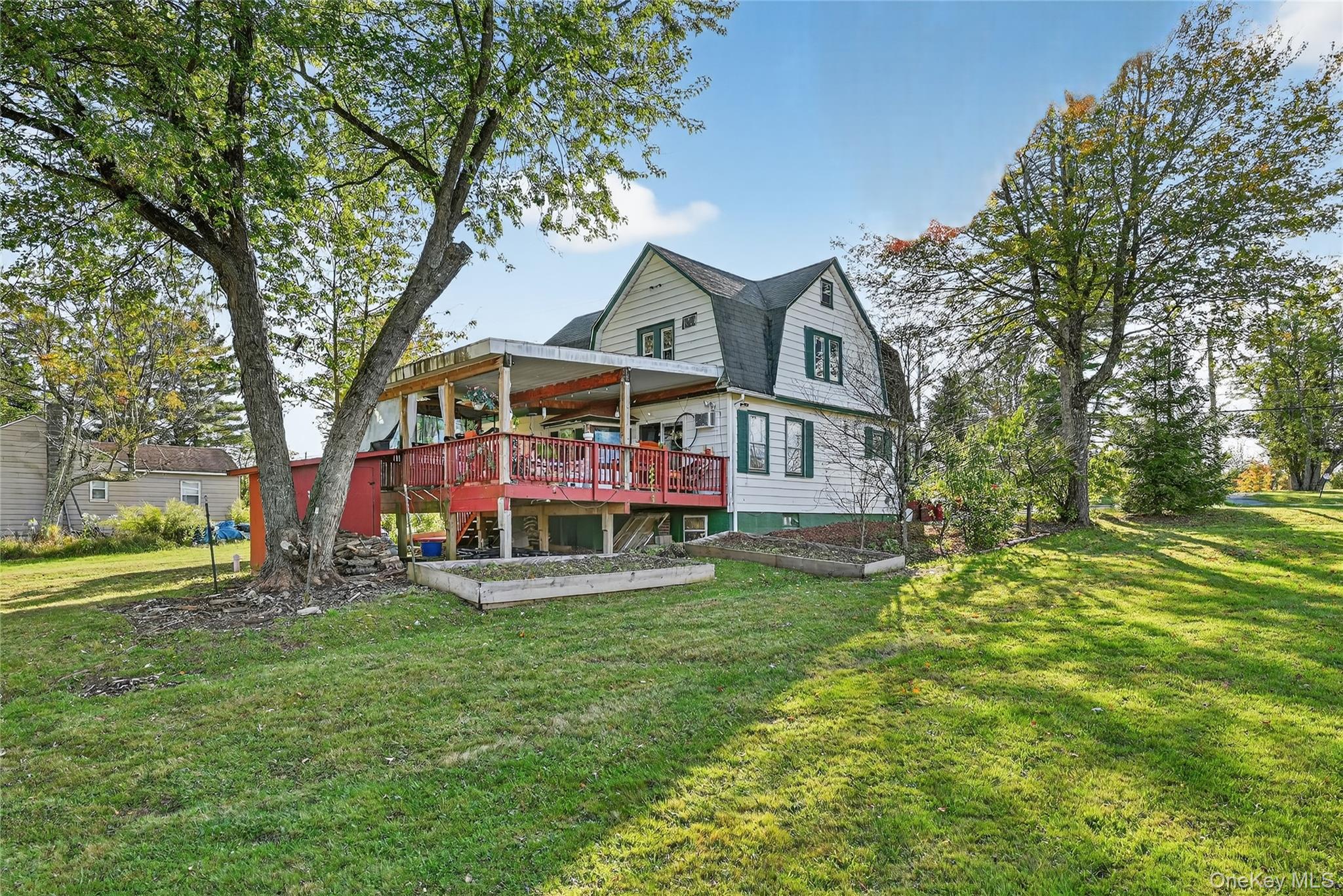 194 Old Liberty Road Monticello, NY 12701 - Photo 30 of 33 a view of a big house with a big yard and large trees