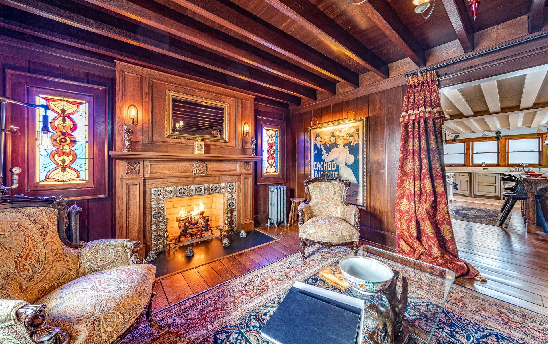 612 South Bayview Strathmere, NJ 08248 - Photo 3 of 38 a living room with furniture a fireplace and wooden floor