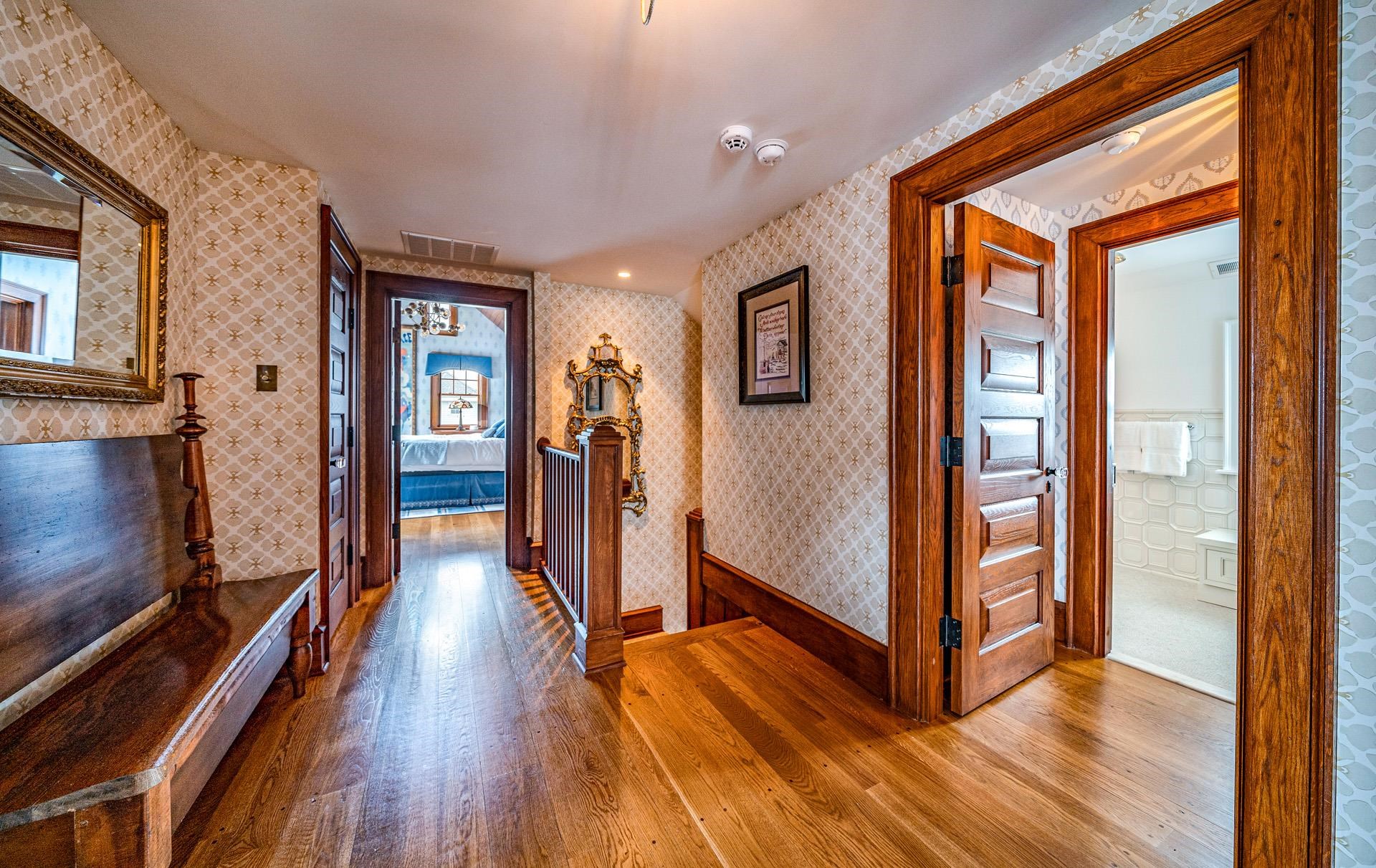 612 South Bayview Strathmere, NJ 08248 - Photo 10 of 38 a view of a hallway with wooden floor and stairs