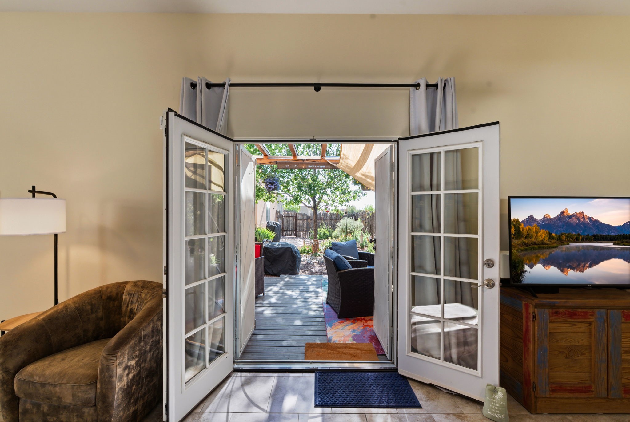 3 Silver Buckle Road Santa Fe, NM 87508 - Photo 5 of 34 Indoor/Outdoor living with French doors