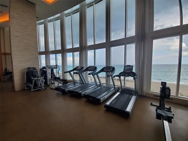 a view of a lake with beach and ocean view