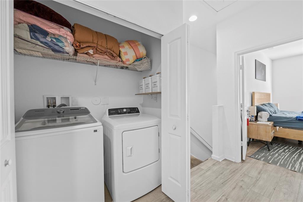 197 Southwest 6th Place, Unit 197 Pompano Beach, FL 33060 - Photo 25 of 25 a view of storage and utility room with washer and dryer