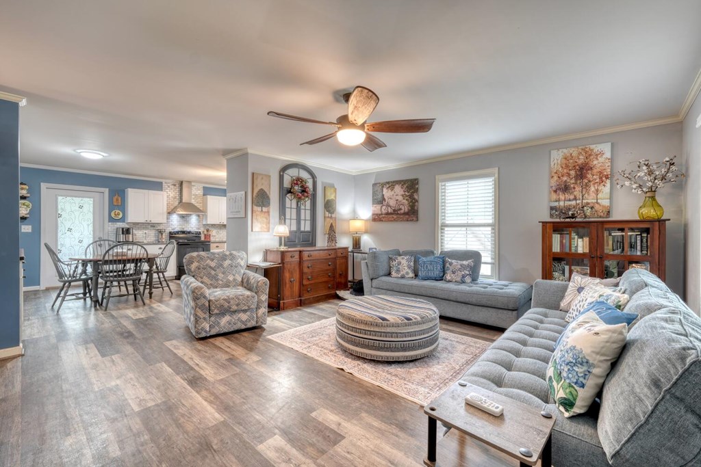 109 Hefner Road Blairsville, GA 30512 - Photo 2 of 48 a living room with furniture or couch and a bookshelf
