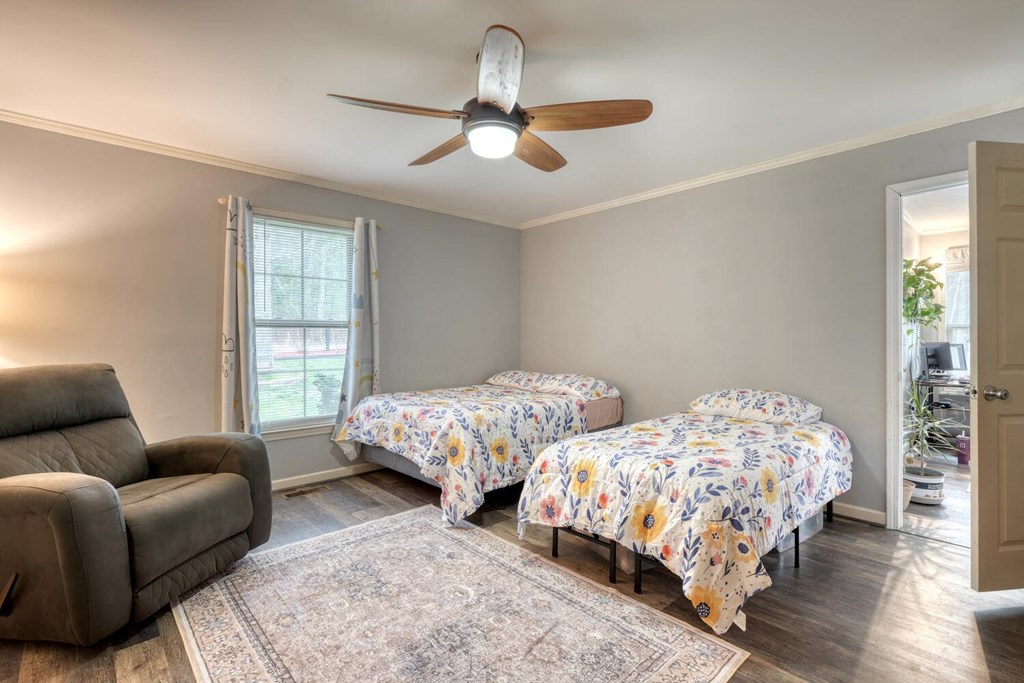 109 Hefner Road Blairsville, GA 30512 - Photo 26 of 48 a bedroom with two beds and a window