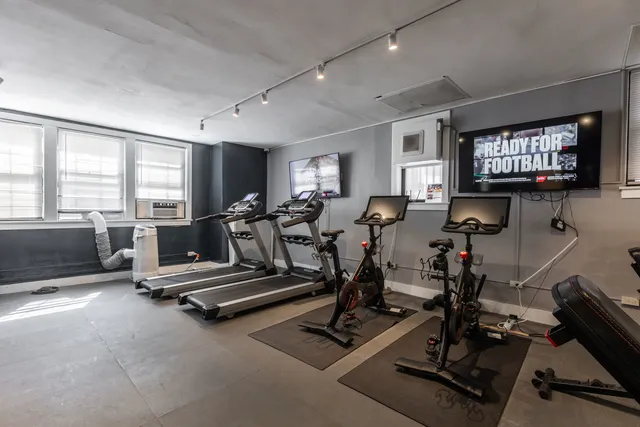 a view of a room with gym equipment
