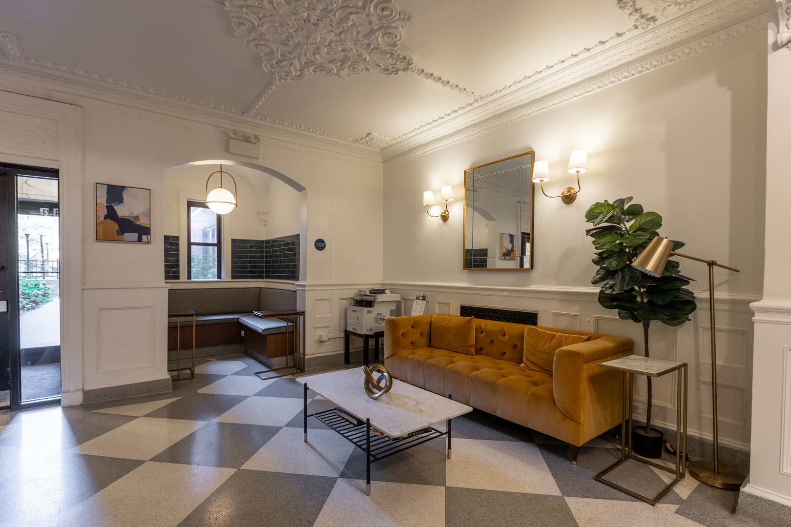 1140 North LaSalle Drive, Unit 203 Chicago, IL 60610 - Photo 20 of 25 a living room with furniture and a mirror