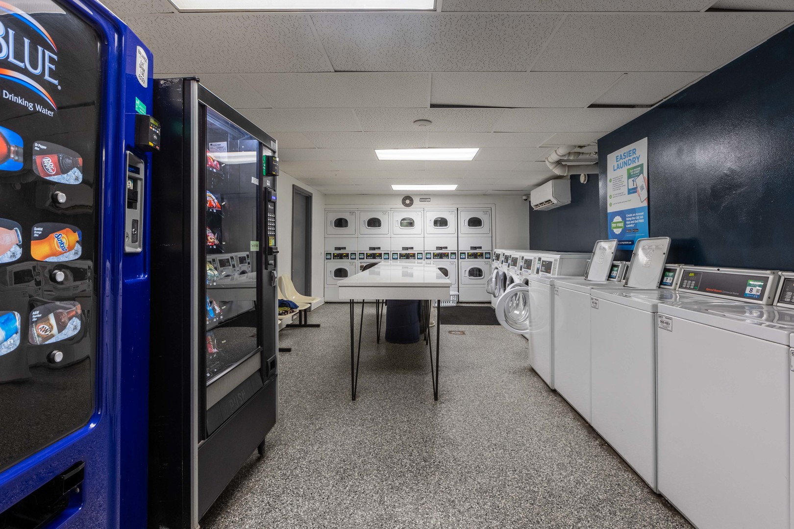 1140 North LaSalle Drive, Unit 203 Chicago, IL 60610 - Photo 22 of 25 a kitchen with appliances a sink and cabinets