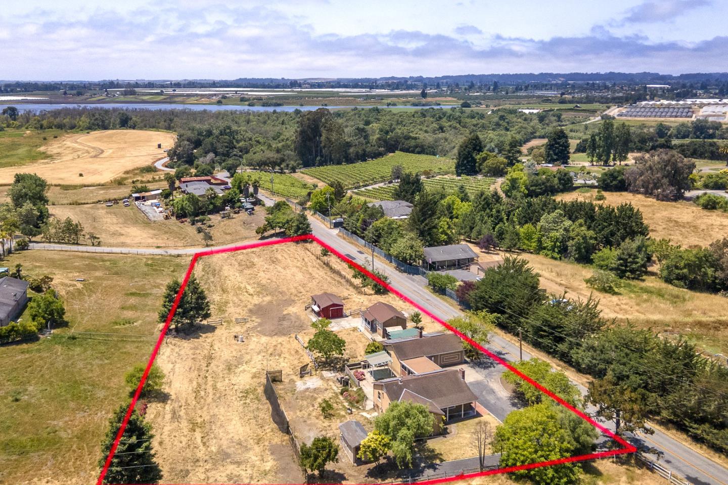 137 Whiting Road Watsonville, CA 95076 - Photo 2 of 52 a view of a lake with a mountain view