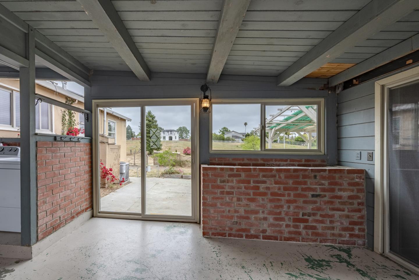 137 Whiting Road Watsonville, CA 95076 - Photo 27 of 52 a view of an empty room with windows