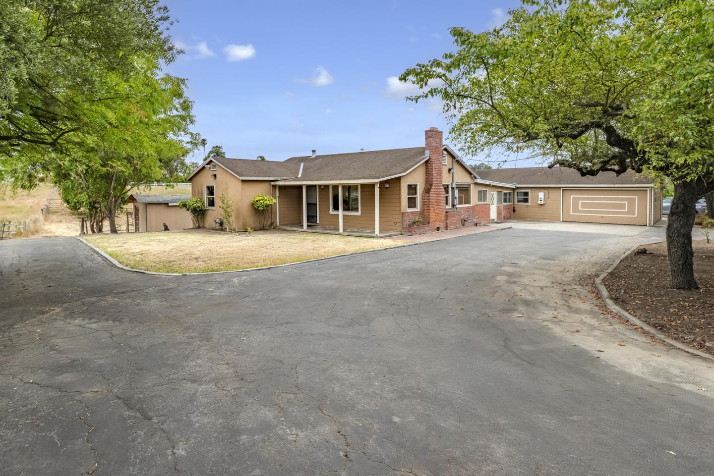 137 Whiting Road Watsonville, CA 95076 - Photo 3 of 52 a front view of a house with a garden