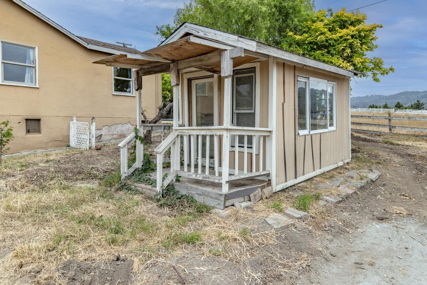 137 Whiting Road Watsonville, CA 95076 - Photo 40 of 52 a view of a house with a yard and wooden floor