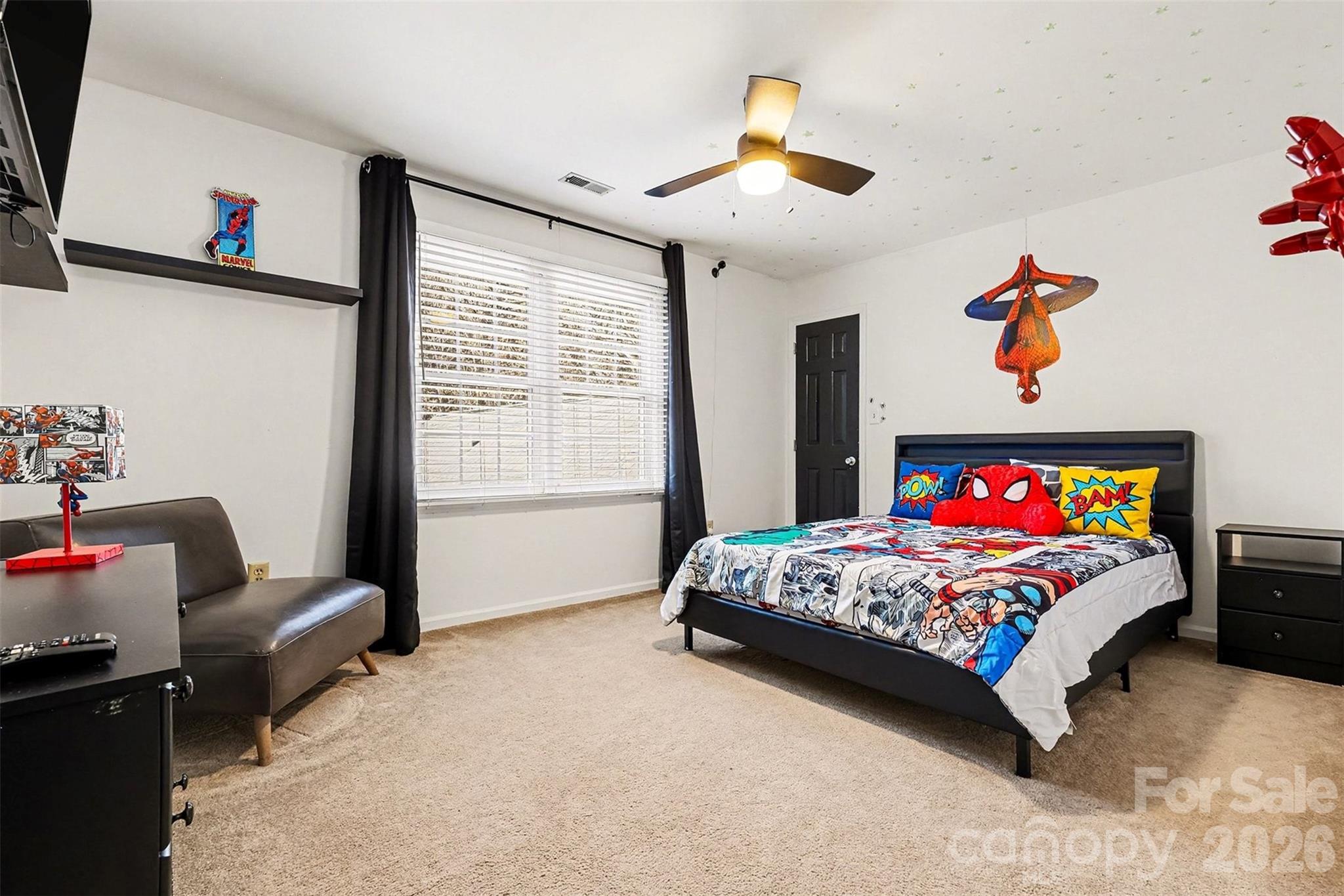 14320 Youngblood Road Charlotte, NC 28278 - Photo 24 of 41 a bedroom with a bed and furniture