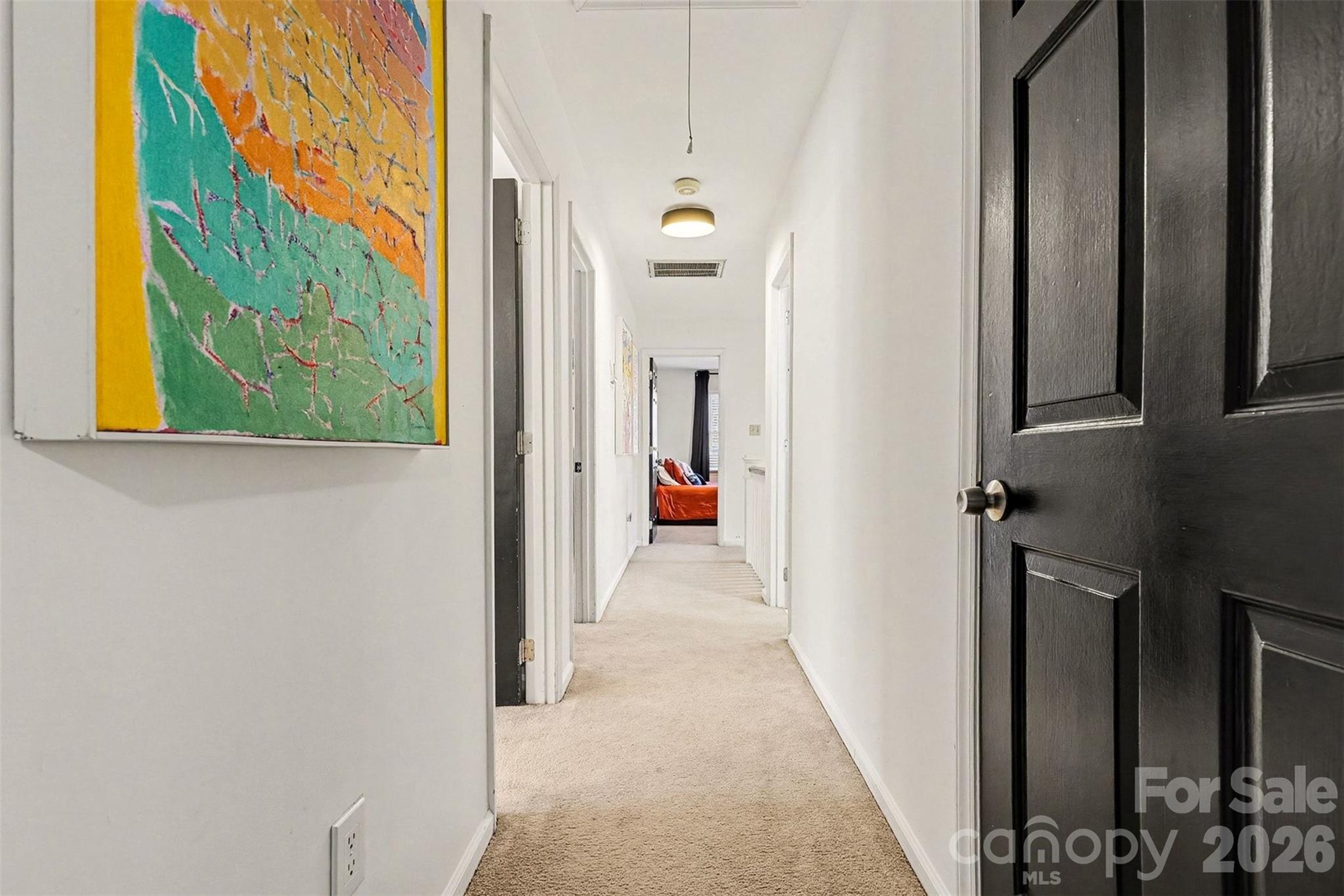 14320 Youngblood Road Charlotte, NC 28278 - Photo 27 of 41 a view of a hallway with wooden shelves