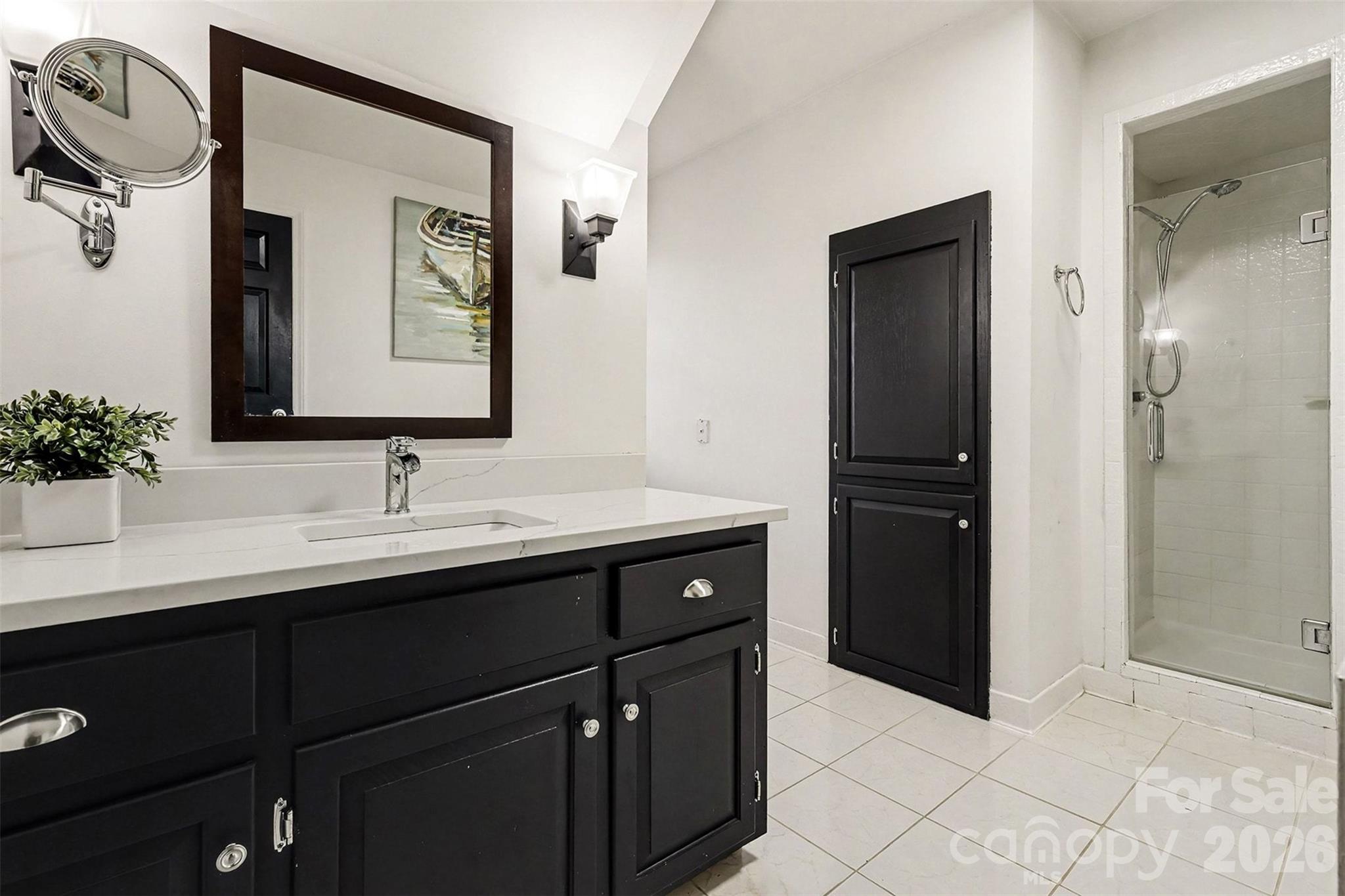 14320 Youngblood Road Charlotte, NC 28278 - Photo 28 of 41 a bathroom with a sink and a mirror