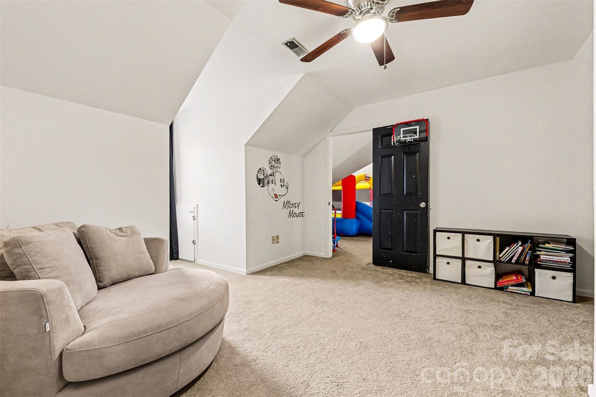 14320 Youngblood Road Charlotte, NC 28278 - Photo 34 of 41 a living room with furniture and a ceiling fan