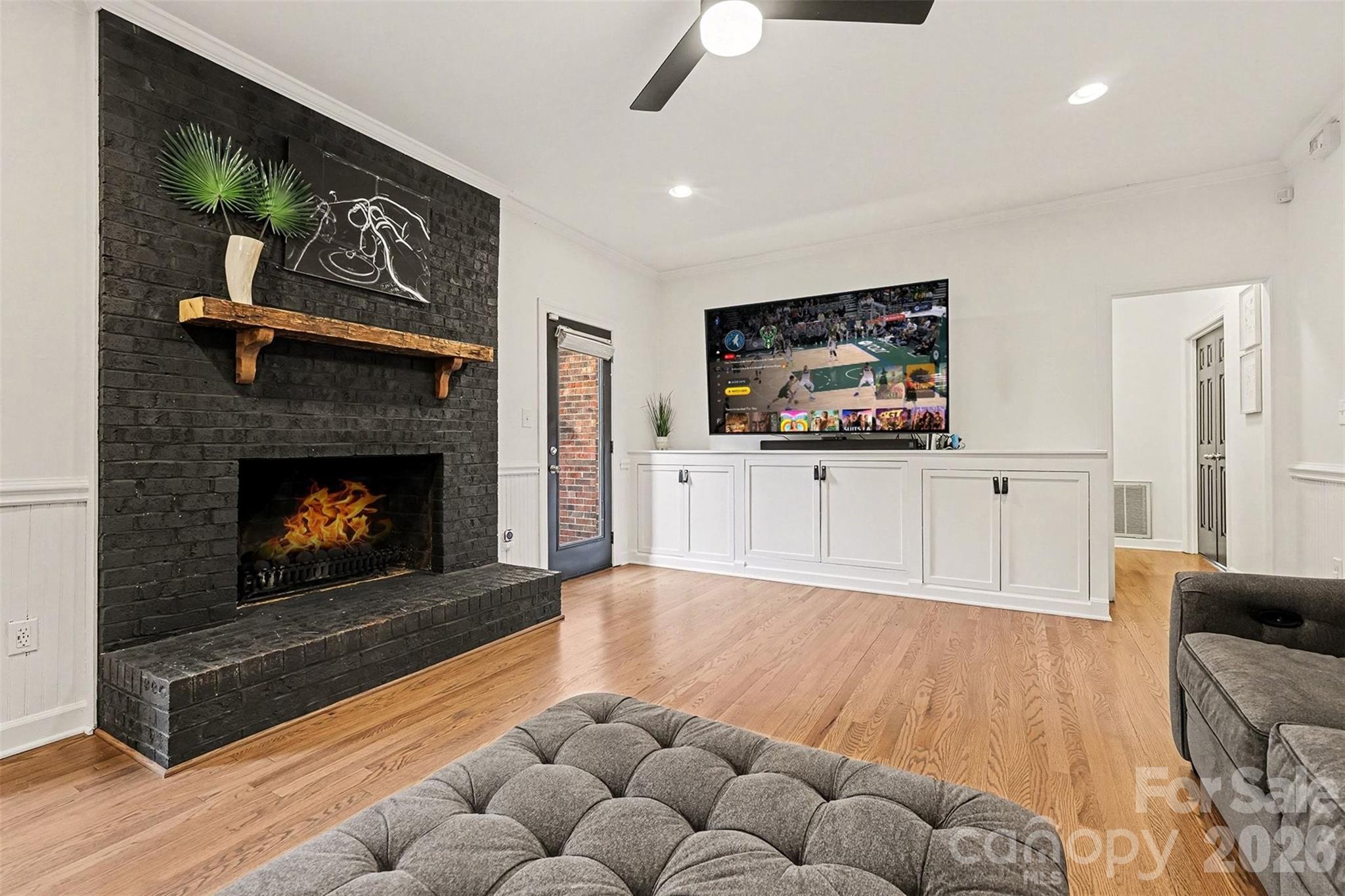 14320 Youngblood Road Charlotte, NC 28278 - Photo 5 of 41 a living room with furniture and a fireplace