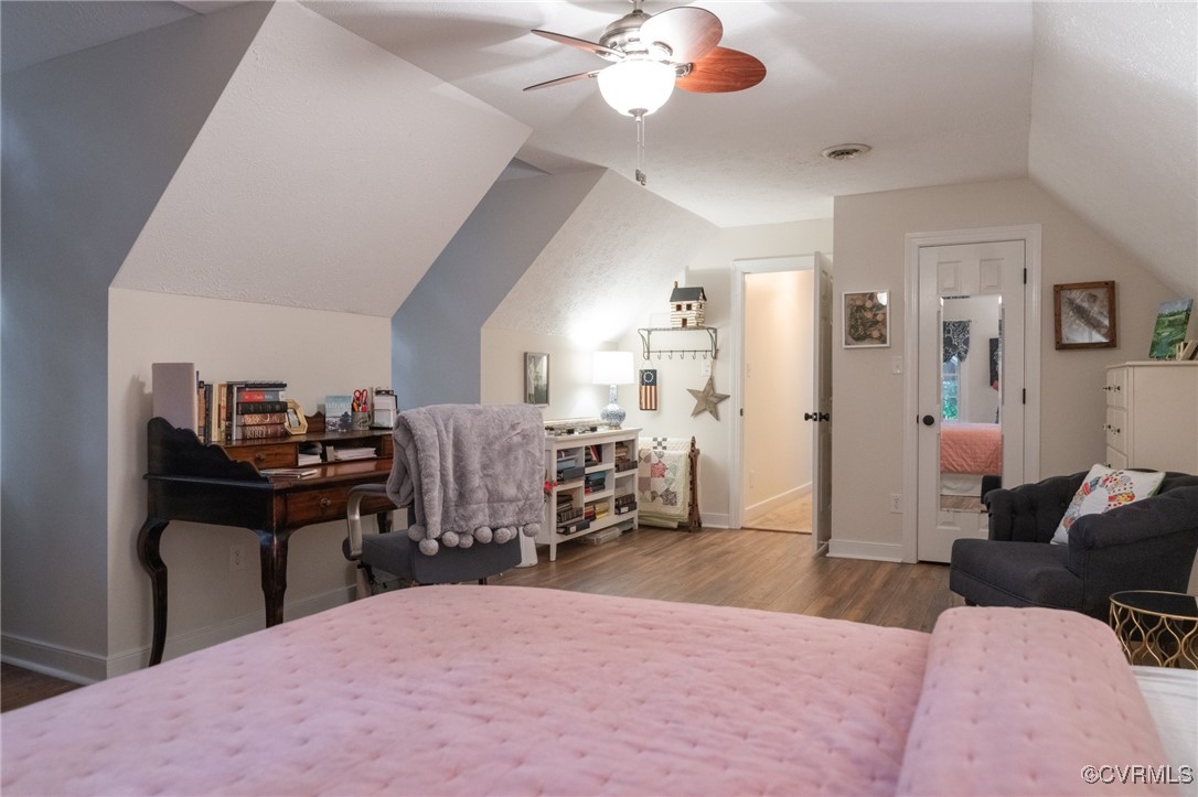 5810 Fox Briar Road Midlothian, VA 23112 - Photo 36 of 50 a bedroom with a bed and a chandelier