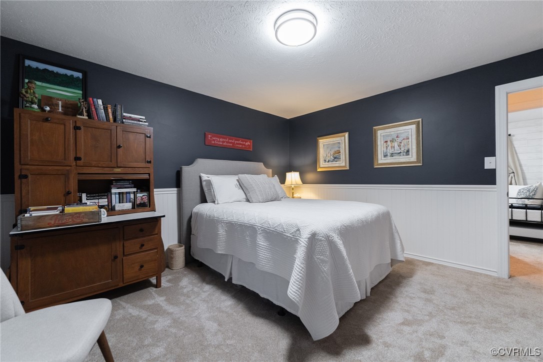 5810 Fox Briar Road Midlothian, VA 23112 - Photo 39 of 50 a bedroom with a bed and dresser