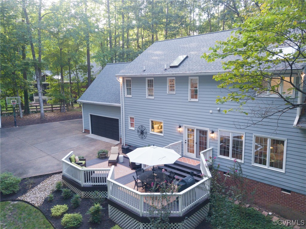 5810 Fox Briar Road Midlothian, VA 23112 - Photo 7 of 50 a aerial view of a house with a yard table and chairs