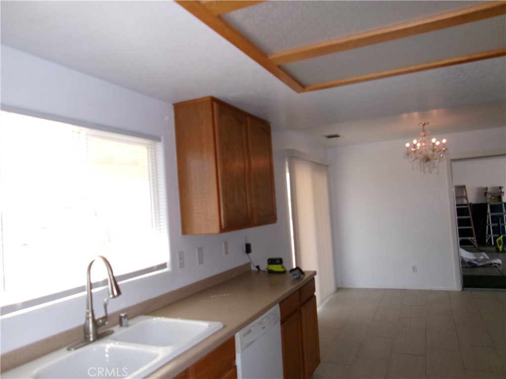 14936 Central Road Apple Valley, CA 92307 - Photo 6 of 33 a bathroom with a sink and a mirror