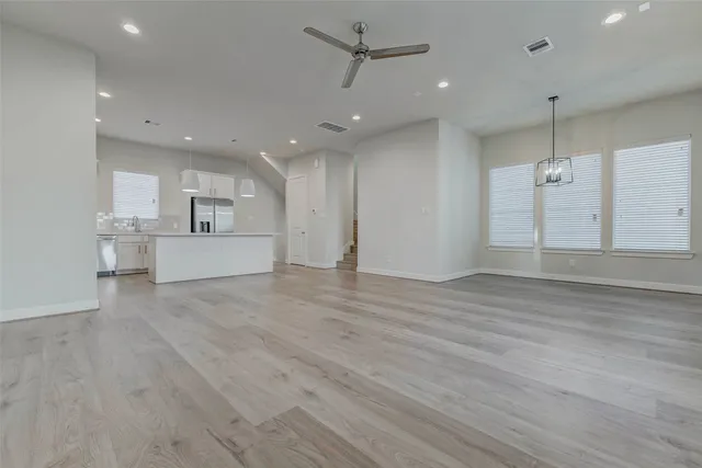 a view of a living room and entryway