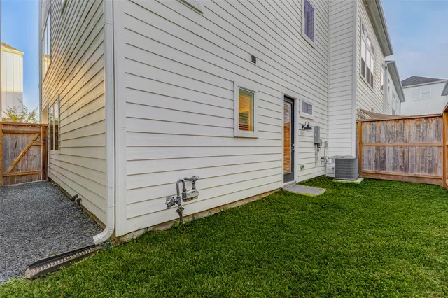 a view of a back yard of the house