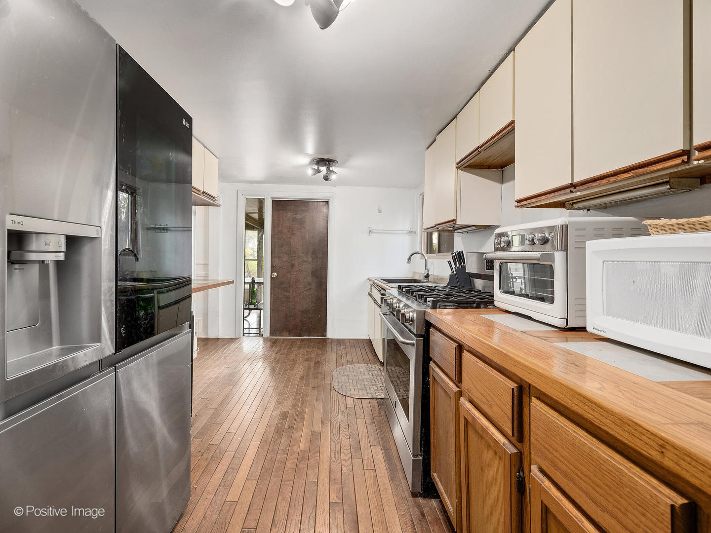 S639 Prince Crossing Road Winfield, IL 60190 - Photo 25 of 33 a kitchen with stainless steel appliances granite countertop a stove and a refrigerator
